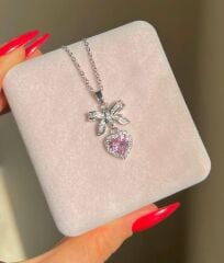 fiyonklu pembe kalp  özel tasarım kararmaz çelik kolye fiyonk konseptli pembe kalp kolye