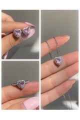 kararmaz çelik pembe kalp kolye küpe yüzük seti ve pembe lotus mum özel hediye sepeti