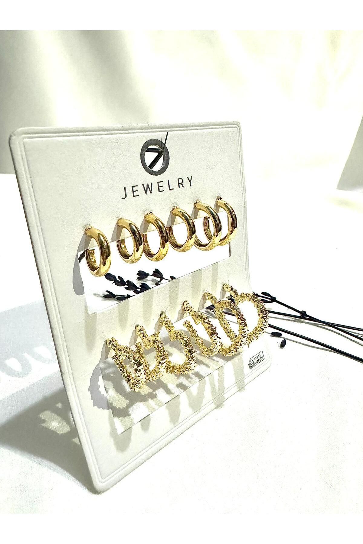 12li set   kadın halka küpe ve  tırtıklı kalp küpe detaylı kombin set